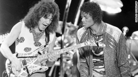 This 1984 photo shows Van Halen performing the song & quot;  Beat It & quot;  With Michael Jackson
