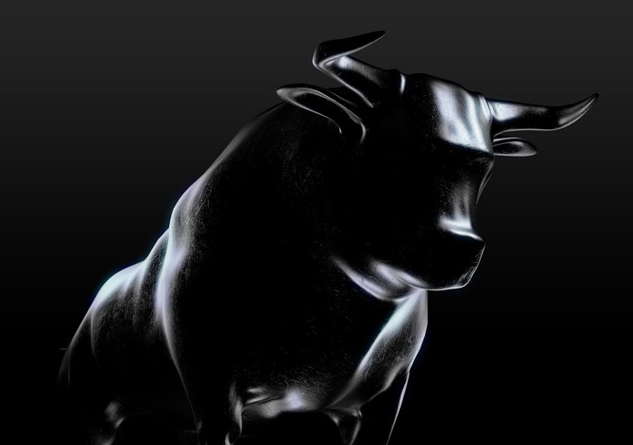 Shaded outline of a bull on a black background. 