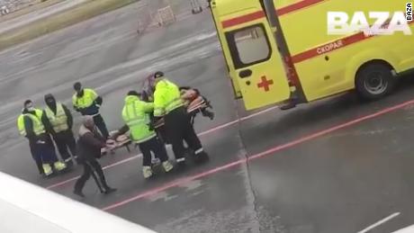 Navalny was treated by paramedics within minutes of the sudden landing in Omsk.