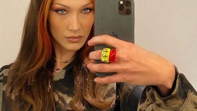 Photo of Bella Hadid wears a glamorous look with a acidic hoodie after ringing the New Year with a new red