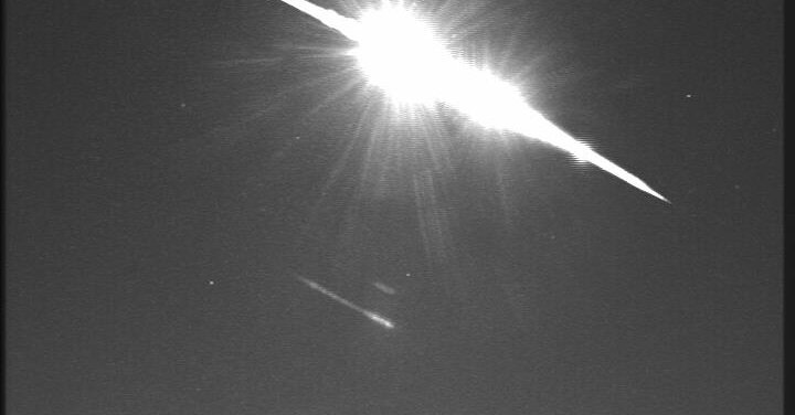 The meteor protrudes like fireworks over the UK skyline at night