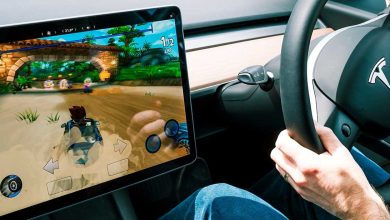 Photo of Tesla under investigation for driving video games