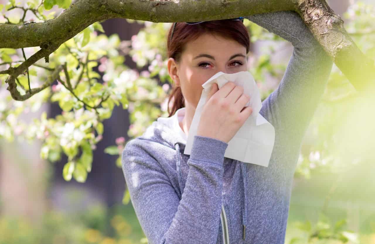 Young woman allergic to pollen