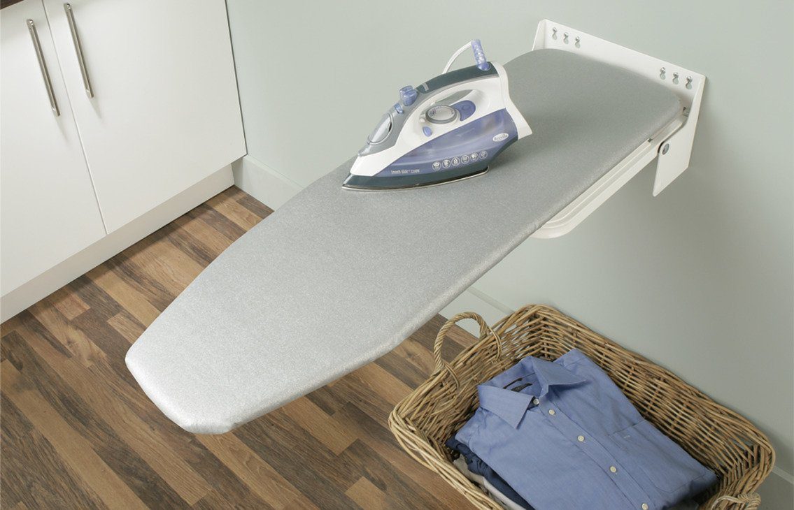 Wall-mounted ironing board: 4 models and useful tips