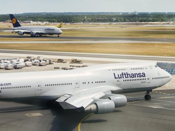A Boeing 747 in the foreground and an Airbus A380 in the background, the direct competitor (Photo by Matthew Brown/Unsplash)